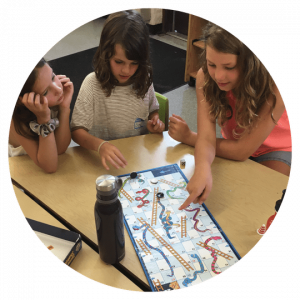 kids playing board and card games